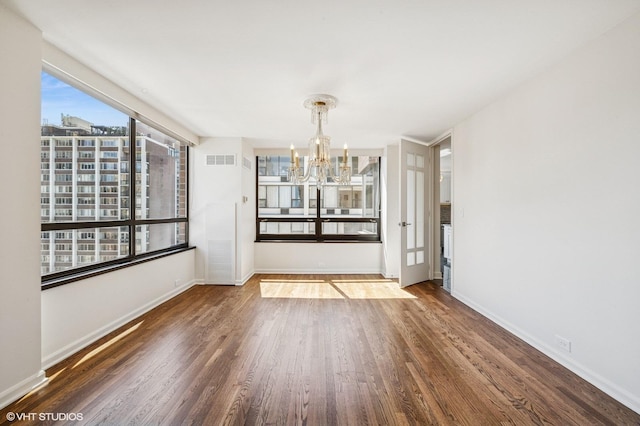 1410 N State Pkwy Unit 17B, Chicago, IL 60610 - unfurnished dining area with a chandelier and wood finished floors
