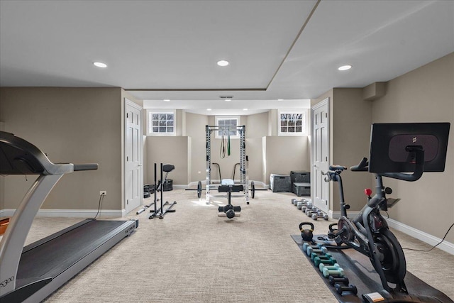 exercise room featuring baseboards, recessed lighting, and carpet floors