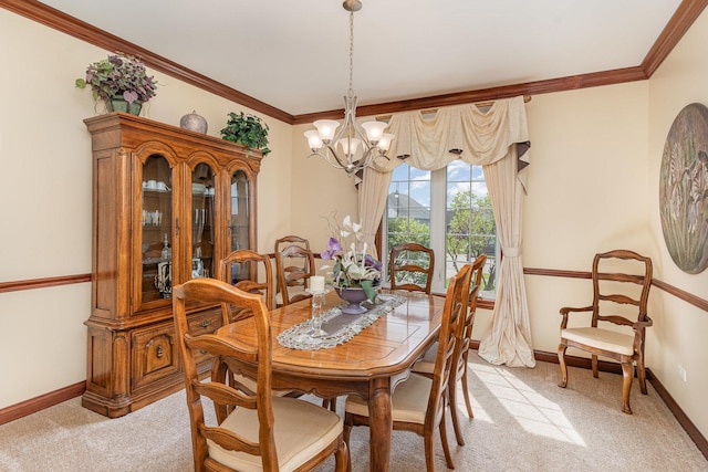 dining room with light colored carpet, baseboards, crown molding, and a notable chandelier