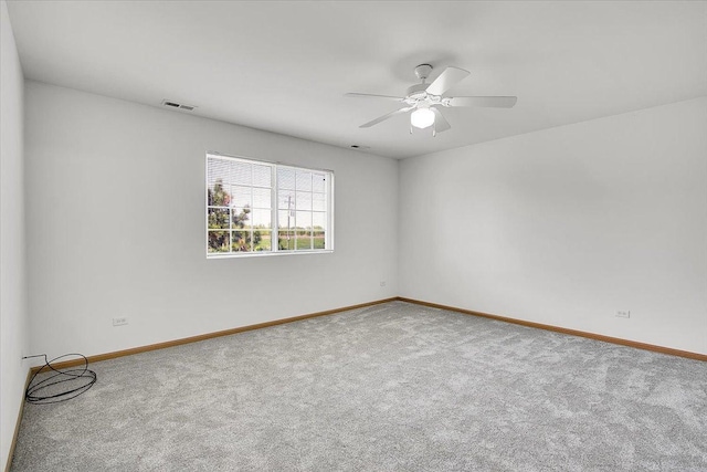 1123 Coneflower Ct, Minooka, IL 60447 - carpeted spare room featuring ceiling fan and baseboards