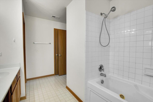 1123 Coneflower Ct, Minooka, IL 60447 - bathroom featuring baseboards, shower / washtub combination, vanity, and tile patterned floors