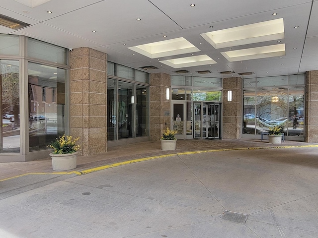 view of exterior entry with visible vents