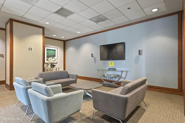 carpeted living room with baseboards, ornamental molding, visible vents, and recessed lighting