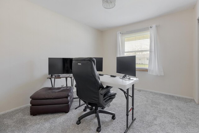 office featuring baseboards and carpet