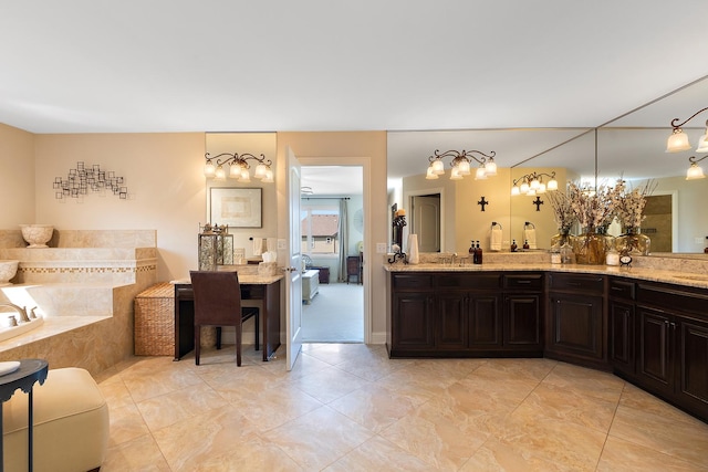 bathroom with a sink, tile patterned floors, a garden tub, and double vanity
