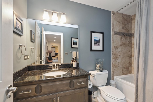 full bath with baseboards, vanity, toilet, ensuite bathroom, and shower / bath combo with shower curtain