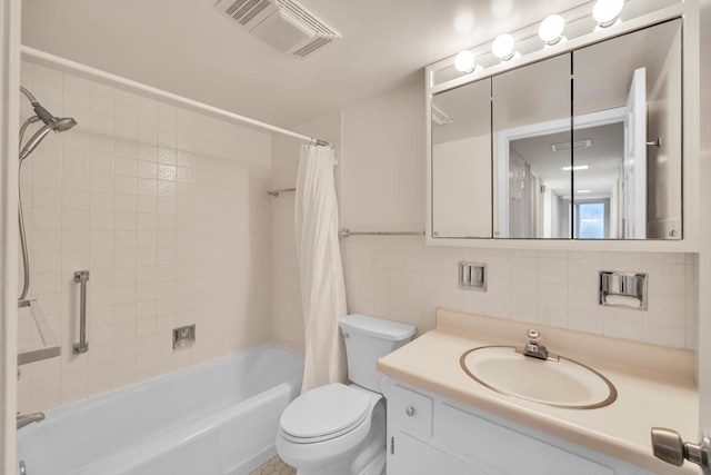 2900 Maple Ave Unit 5A, Downers Grove, IL 60515 - bathroom with visible vents, tasteful backsplash, shower / bath combo, vanity, and toilet