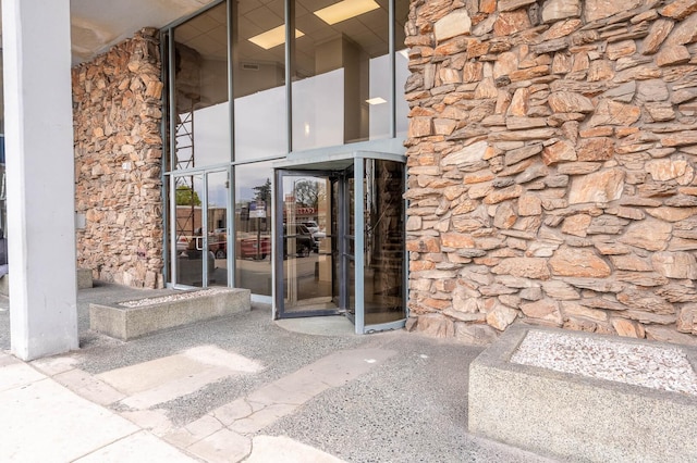 7234 W N Ave Unit 1005, Elmwood Park, IL 60707 - doorway to property featuring stone siding