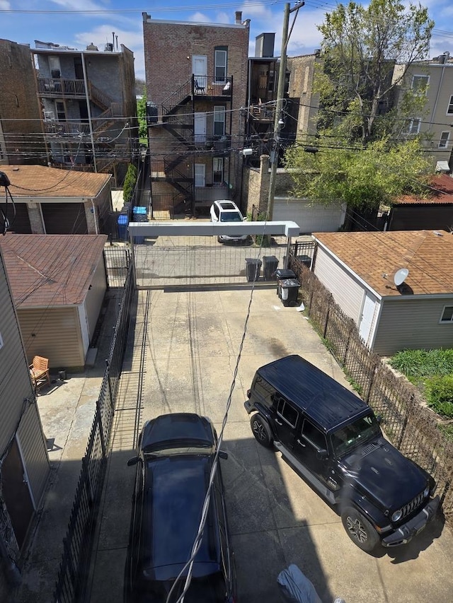 exterior space featuring a gate and fence