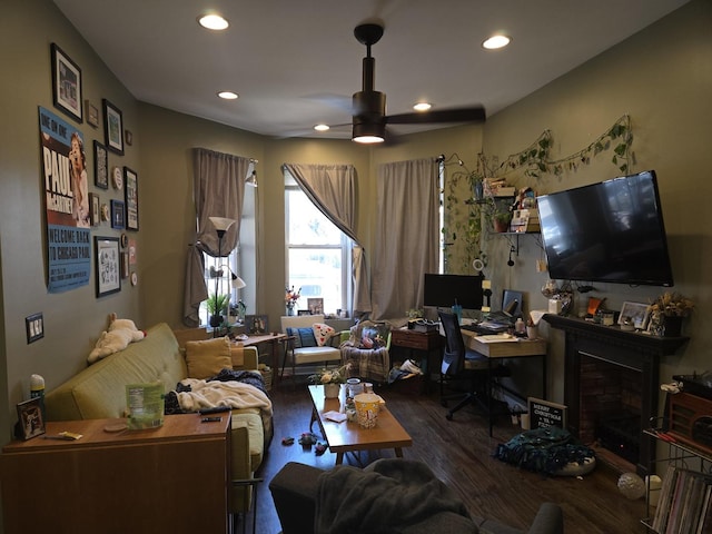 office with a fireplace, a ceiling fan, recessed lighting, and wood finished floors