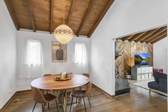 6029 Osage Ave, Downers Grove, IL 60516 - dining area with hardwood / wood-style flooring, wooden ceiling with exposed beams, baseboards, a chandelier, and high vaulted ceiling
