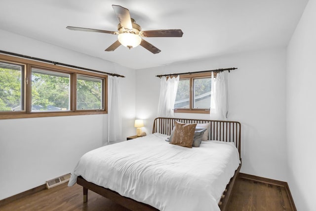 6029 Osage Ave, Downers Grove, IL 60516 - bedroom with wood finished floors, baseboards, and ceiling fan