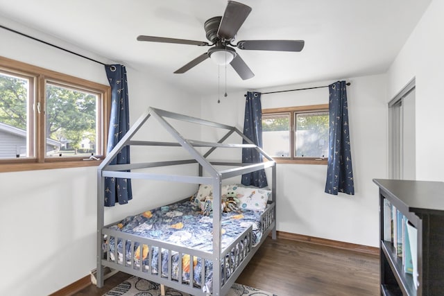 6029 Osage Ave, Downers Grove, IL 60516 - bedroom with baseboards, wood finished floors, and ceiling fan