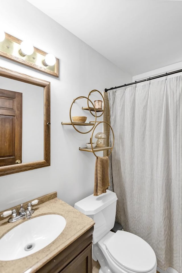6029 Osage Ave, Downers Grove, IL 60516 - bathroom with toilet, vanity, and a shower with shower curtain
