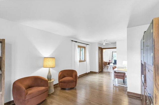 6029 Osage Ave, Downers Grove, IL 60516 - living area featuring wood finished floors, baseboards, and ceiling fan