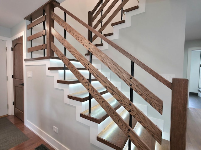 10847 Carpenter St, Mokena, IL 60448 - stairway featuring baseboards and wood finished floors