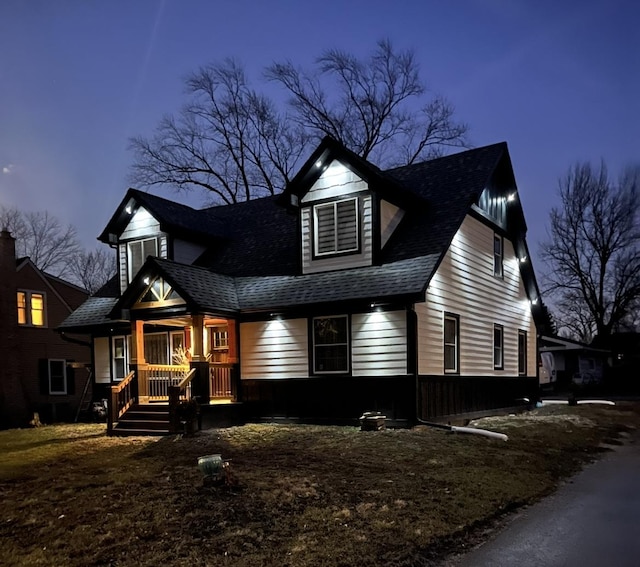 10847 Carpenter St, Mokena, IL 60448 - view of front of house with a shingled roof and covered porch