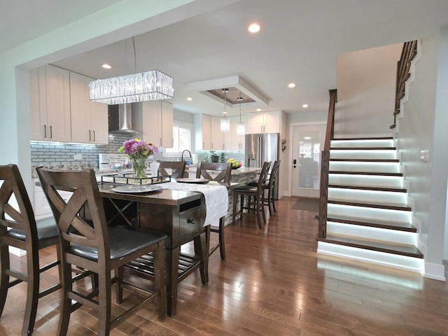 10847 Carpenter St, Mokena, IL 60448 - dining room with recessed lighting, baseboards, dark wood finished floors, and stairway
