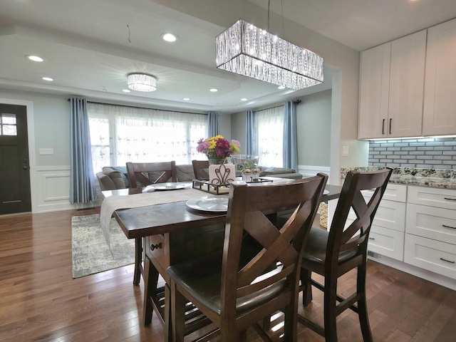 10847 Carpenter St, Mokena, IL 60448 - dining space featuring a decorative wall, recessed lighting, a wainscoted wall, and dark wood-type flooring