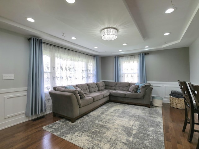 10847 Carpenter St, Mokena, IL 60448 - living area featuring a wainscoted wall, a decorative wall, wood finished floors, and visible vents
