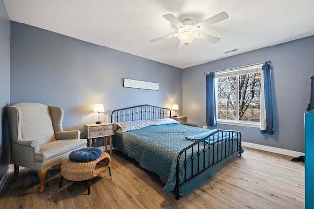 1352 Dahlgren Ln, Minooka, IL 60447 - bedroom featuring baseboards, a ceiling fan, wood finished floors, and visible vents
