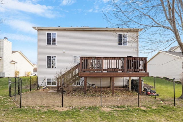 1352 Dahlgren Ln, Minooka, IL 60447 - back of property featuring a lawn, fence, central air condition unit, and a deck