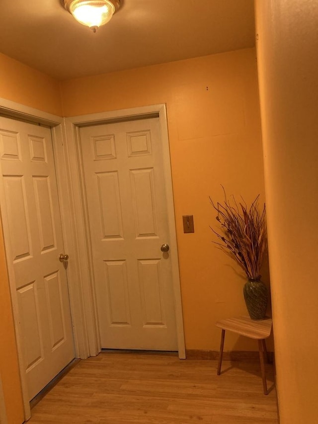 hall with light wood-style flooring