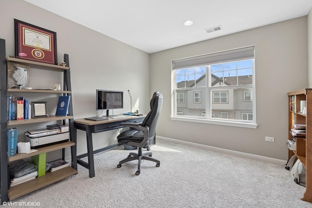 office area with baseboards, carpet, and visible vents