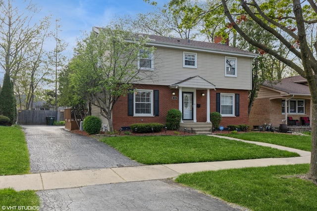 824 Elm St, Flossmoor, IL 60422 - colonial-style house featuring brick siding and a chimney