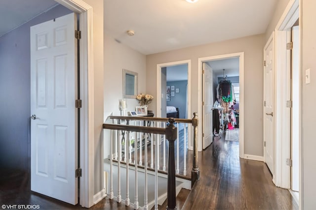 824 Elm St, Flossmoor, IL 60422 - hallway featuring an upstairs landing, dark wood-style floors, and baseboards