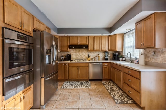 824 Elm St, Flossmoor, IL 60422 - kitchen with appliances with stainless steel finishes, a warming drawer, a sink, decorative backsplash, and light countertops