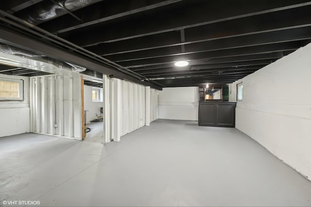 below grade area featuring plenty of natural light