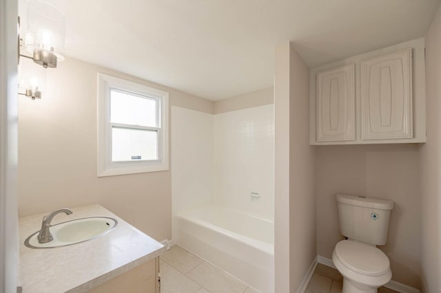 full bathroom with toilet, tile patterned flooring, vanity, and baseboards