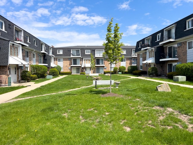 10310 Ridgeland Ave Unit 307, Chicago Ridge, IL 60415 - surrounding community with a yard and a residential view