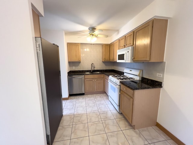 10310 Ridgeland Ave Unit 307, Chicago Ridge, IL 60415 - kitchen with a ceiling fan, white appliances, a sink, dark stone countertops, and decorative backsplash