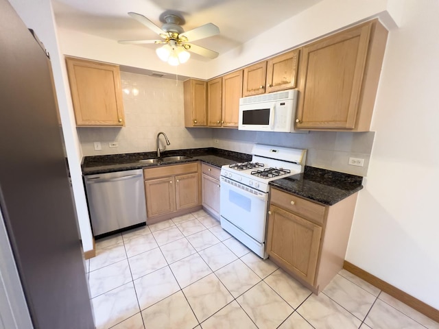 10310 Ridgeland Ave Unit 307, Chicago Ridge, IL 60415 - kitchen featuring a sink, white appliances, dark stone counters, decorative backsplash, and a ceiling fan