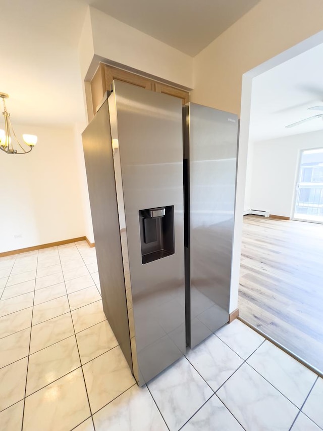 10310 Ridgeland Ave Unit 307, Chicago Ridge, IL 60415 - kitchen with stainless steel refrigerator with ice dispenser, a chandelier, light tile patterned floors, baseboard heating, and baseboards