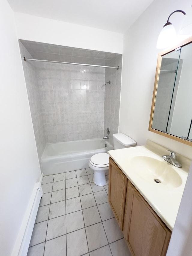 10310 Ridgeland Ave Unit 307, Chicago Ridge, IL 60415 - bathroom featuring baseboard heating, toilet, tile patterned floors, vanity, and shower / washtub combination