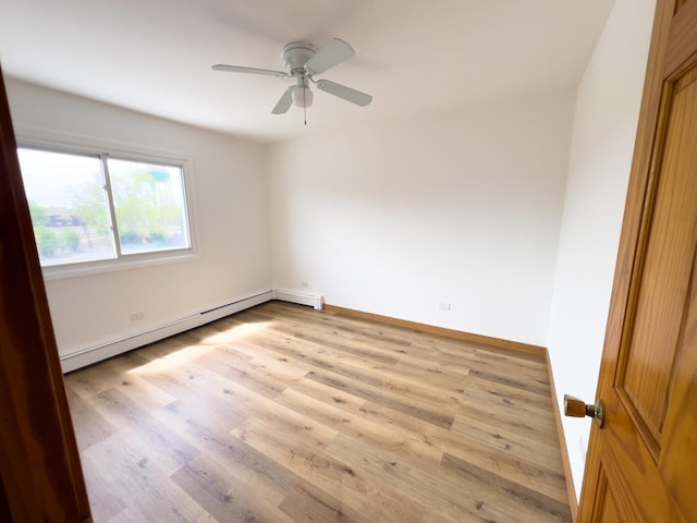 10310 Ridgeland Ave Unit 307, Chicago Ridge, IL 60415 - unfurnished room with baseboards, wood finished floors, baseboard heating, and ceiling fan