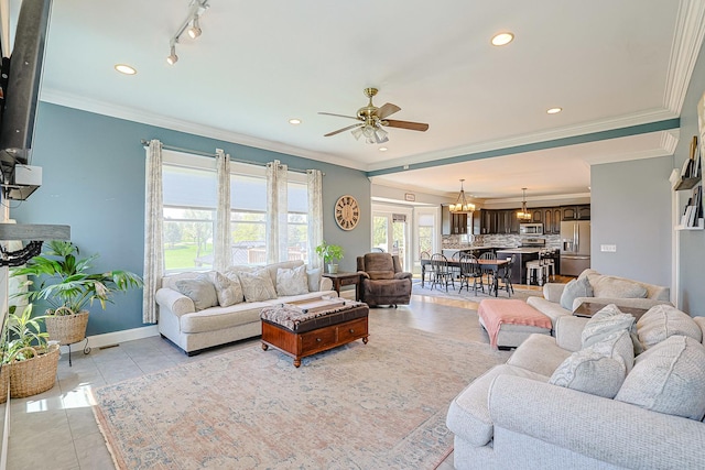 living room featuring ceiling fan, recessed lighting, ornamental molding, a chandelier, and light tile patterned floors