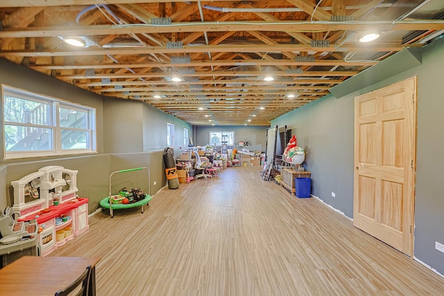 game room featuring wood finished floors and recessed lighting