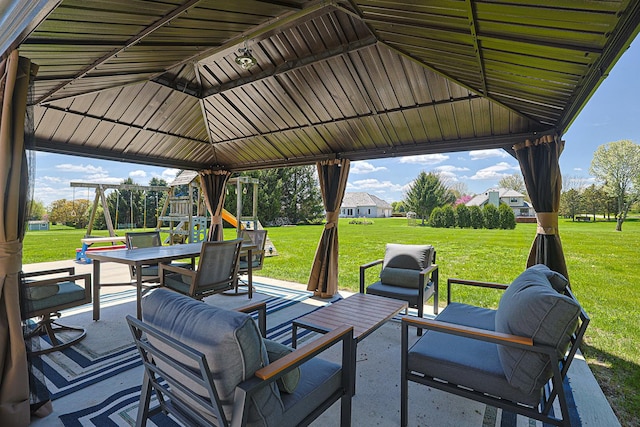 view of patio / terrace featuring an outdoor hangout area, a gazebo, and a playground