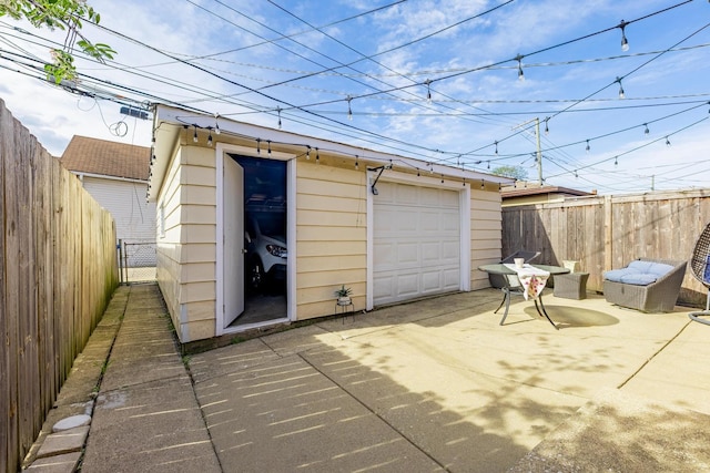 garage with fence