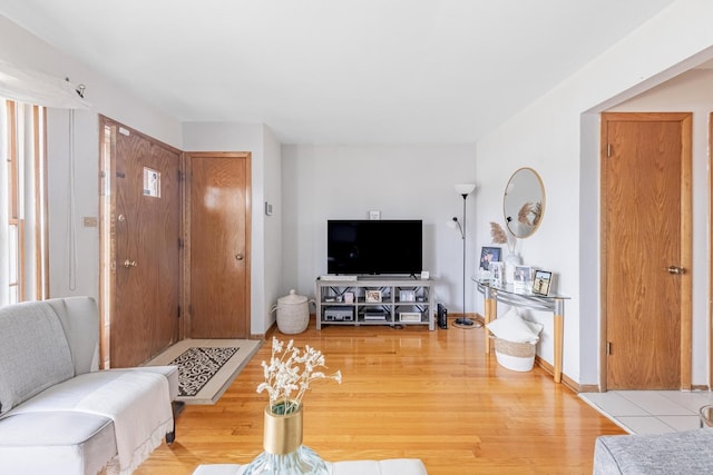 living area featuring light wood-style flooring
