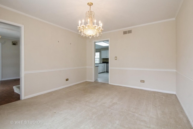 23 Westmoreland Ln, Naperville, IL 60540 - empty room featuring light colored carpet, crown molding, visible vents, baseboards, and a chandelier