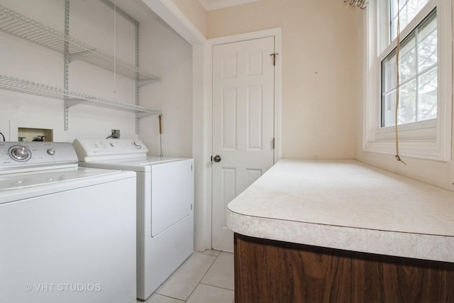 23 Westmoreland Ln, Naperville, IL 60540 - laundry area featuring separate washer and dryer, laundry area, light tile patterned floors, and a healthy amount of sunlight