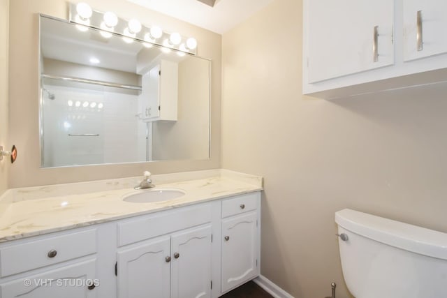 23 Westmoreland Ln, Naperville, IL 60540 - bathroom featuring toilet, a shower, and vanity