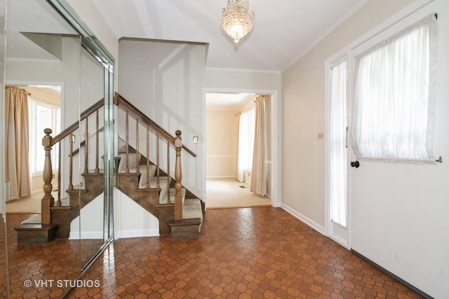 23 Westmoreland Ln, Naperville, IL 60540 - foyer entrance featuring baseboards, ornamental molding, and stairs
