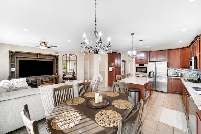 13083 Timber Ct, Palos Heights, IL 60463 - dining space featuring recessed lighting, light tile patterned floors, and ceiling fan with notable chandelier