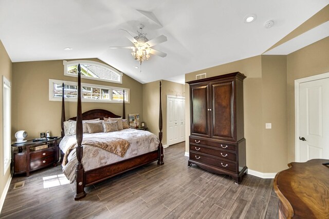 13083 Timber Ct, Palos Heights, IL 60463 - bedroom featuring visible vents, dark wood-style flooring, baseboards, a ceiling fan, and vaulted ceiling